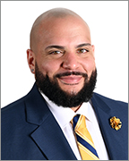 Headshot of Danny Malavé, Managing Director of Team Engagement & Development and DEI Officer